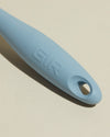 Close-up image of the GIR Slate Quad Chopper handle on a cream background.