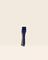 The Royal Blue Ultimate Basting Brush on a cream background. 