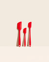 The GIR Red 3 Piece Spatula Set on a cream background. 